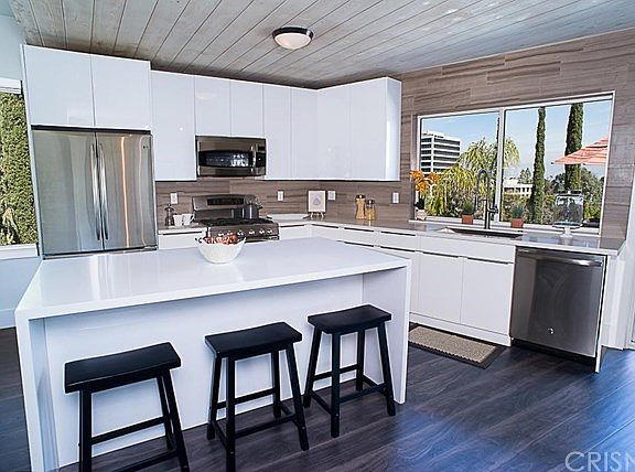 Caeserstone counter tops, Euro style solid wood ca