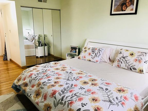 Bedroom with king size bed and plenty of closet space
