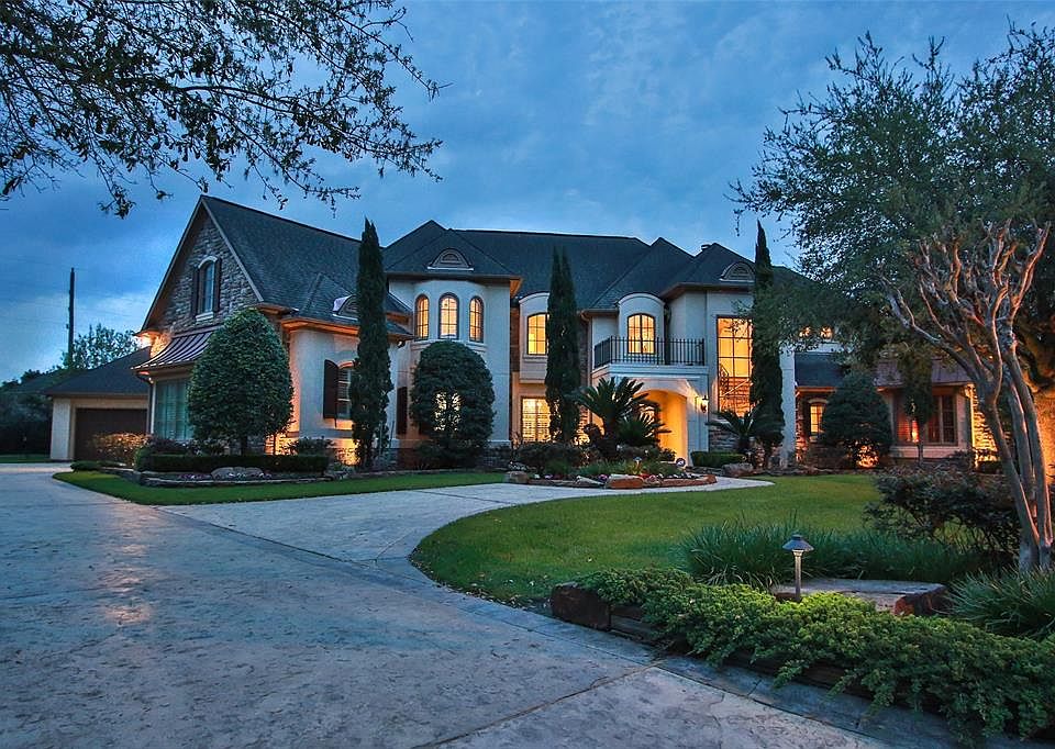 Stunning modern Tuscany styled custom home built by Jim Frankel in Cinco Ranch in The Reserve of Bayou Woods