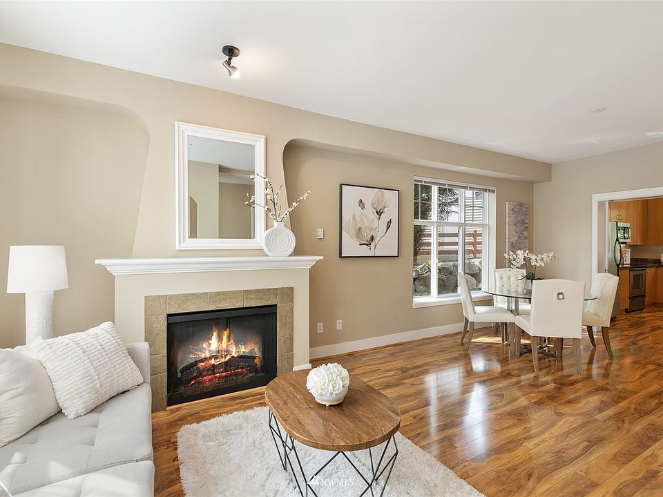 The family room is open to the dining room, perfect for easy flow gatherings.