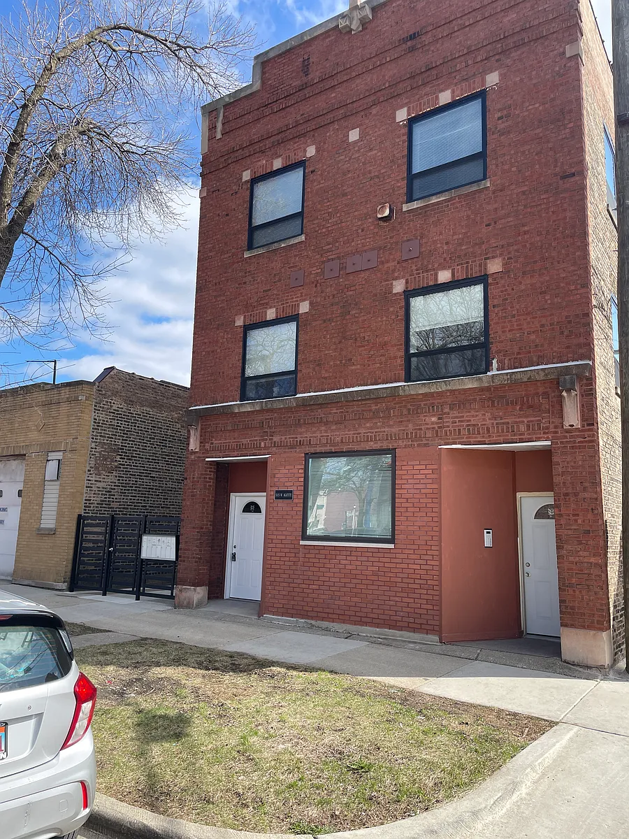Building Photo - 5115 W Agatite Ave #1R