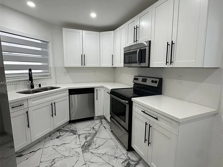 680 NW 124th Pl — Photo 3