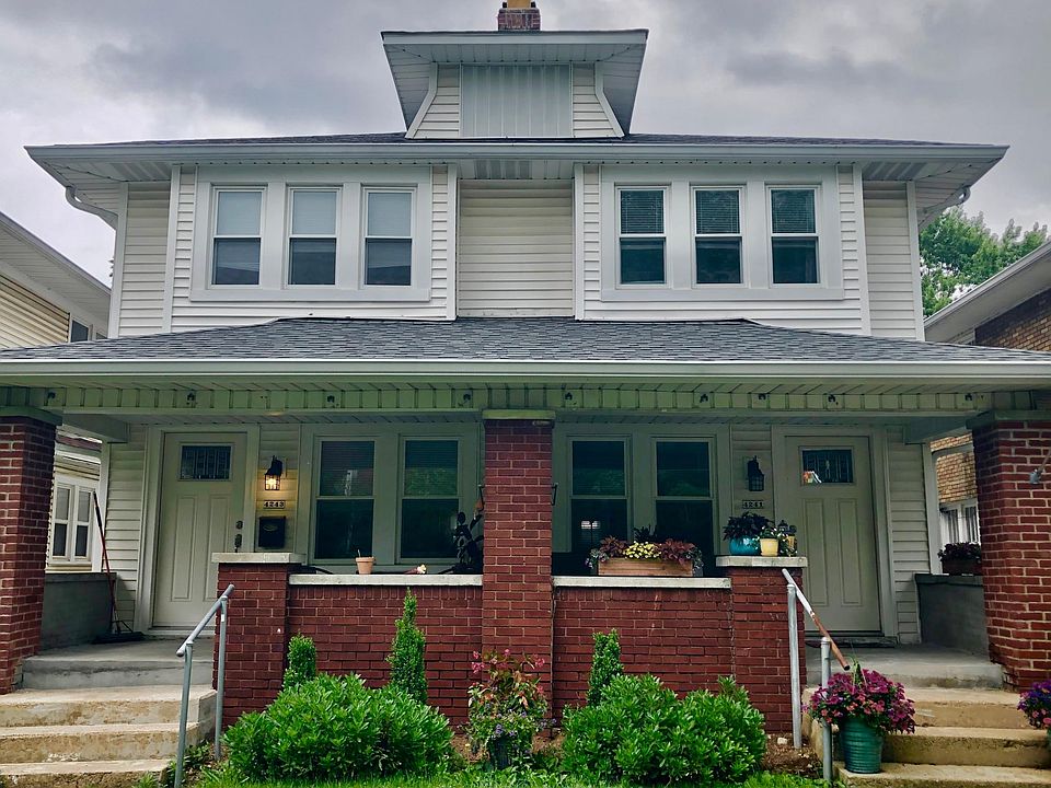Front of home with covered porches!