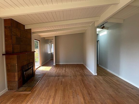 Looking west across living area.