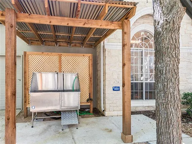 Dog wash station under gazebo