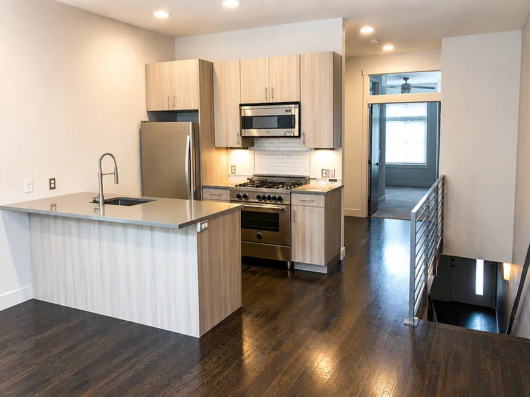 Open Kitchen with Bertazzoni Dual Fuel Range and Oversized Pantry