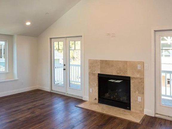 Living room with vaulted ceilings