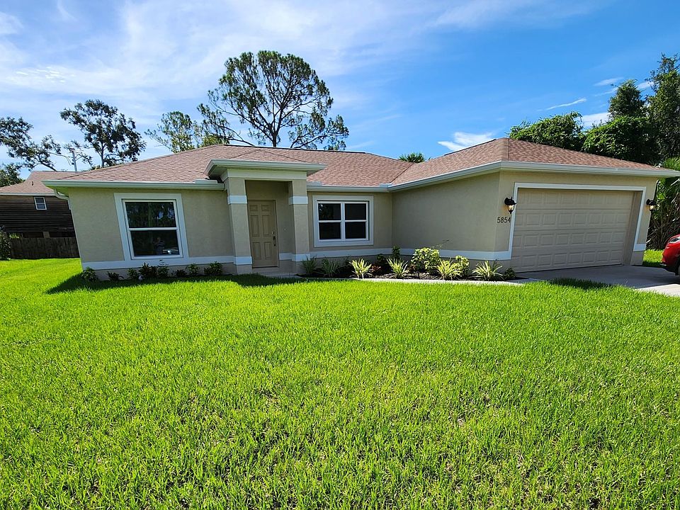 This beautiful NEW home features a 2 car garage, fresh grass and an automated sprinkler system, and hurricane rated windows (no need to put up shutters!)