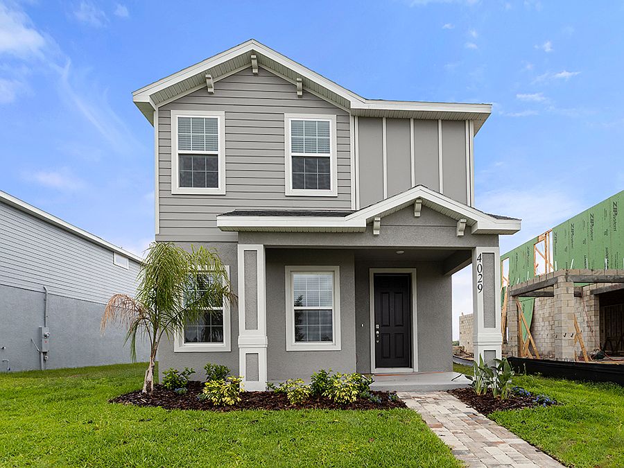 Move-in ready bungalow in St Cloud, FL, with 3 bedrooms, a den, and a loft.