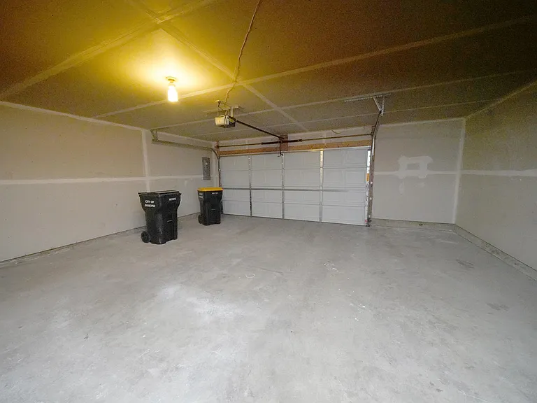 Oversized two car garage - tons of storage with this home