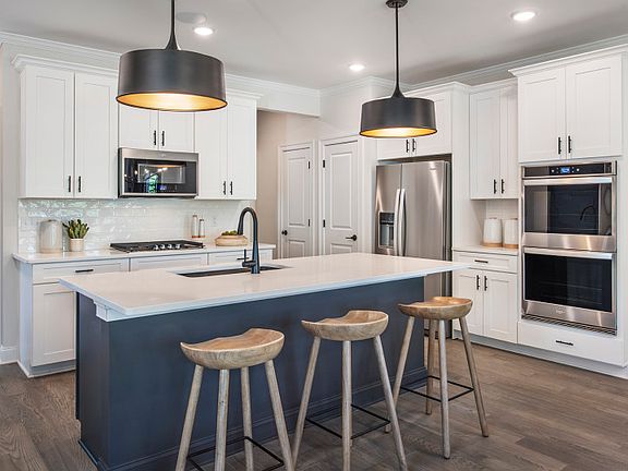 Large kitchen with abundant cabinet and countertop space