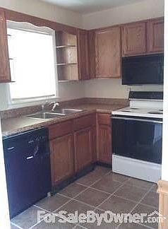 Newly Renovated : New ceramic tile floor, new dishwasher and lots of cabinets with eat in kitchen.