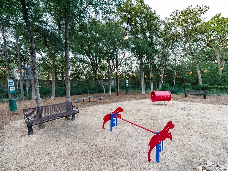Shaded, fenced, and thoughtfully equipped_our on-site dog park makes playtime a treat for both pups and their people.