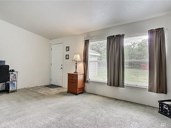 View of main entry in to living room. 