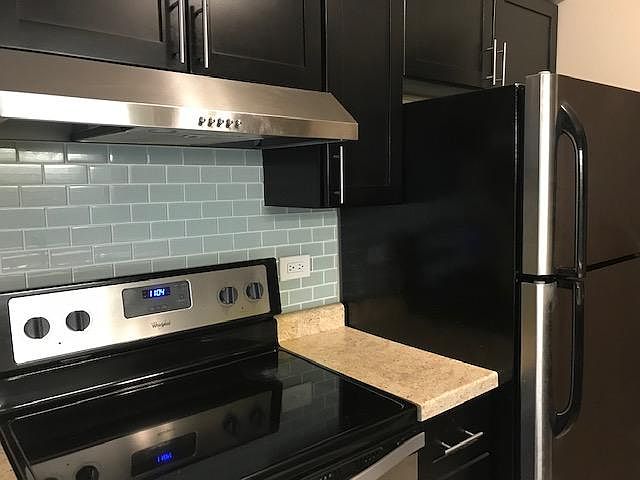 Kitchen with stainless steel appliances