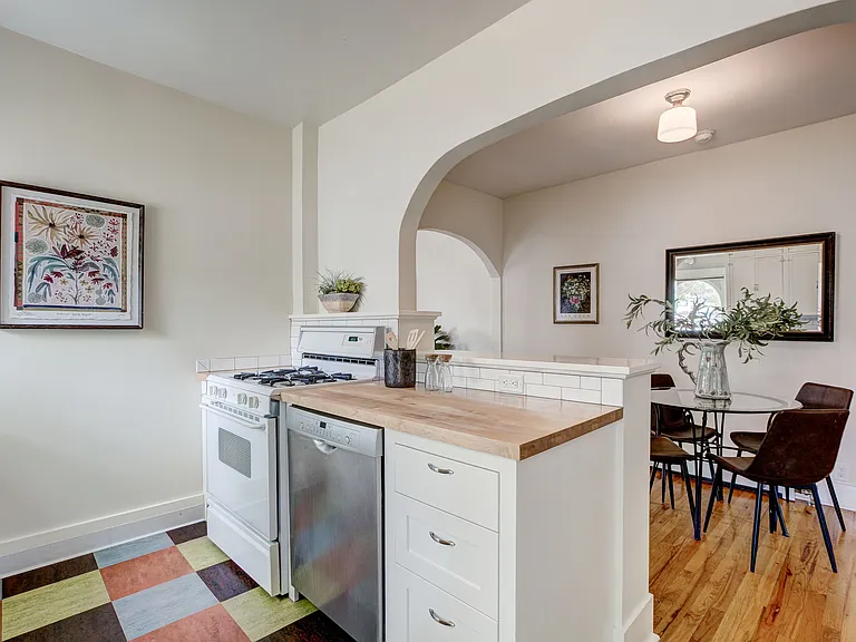 custom cabinetry flanking range and dishwasher