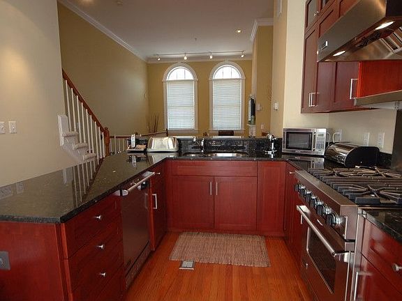 Kitchen opens to Living Room