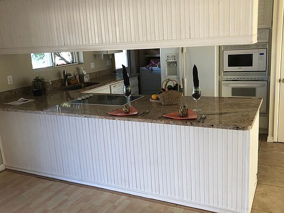 Rock tops sparkle wLED downlighting. Breakfast bar f 5. Grande refrig w water/ice in door. Upgrade sink. Dishwasher, microwave. All open spacious living area. Pantry. Washer/dryer inc.