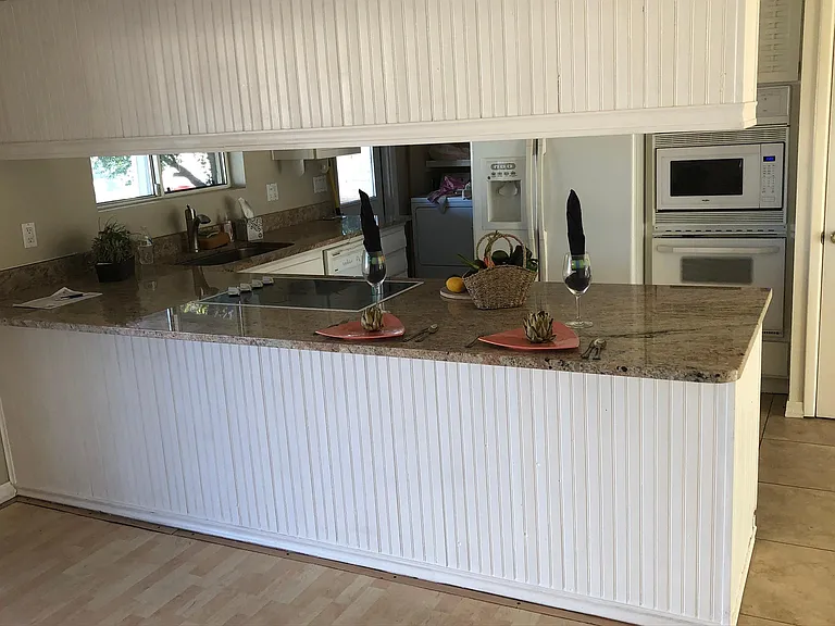 Rock tops sparkle wLED downlighting. Breakfast bar f 5. Grande refrig w water/ice in door. Upgrade sink. Dishwasher, microwave. All open spacious living area. Pantry. Washer/dryer inc.