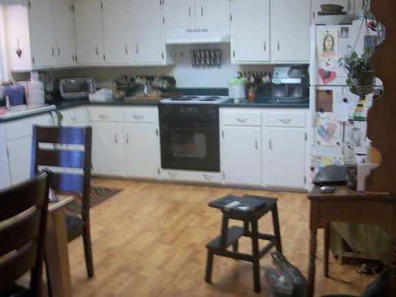 Large eat-In Kitchen with access to the patio.