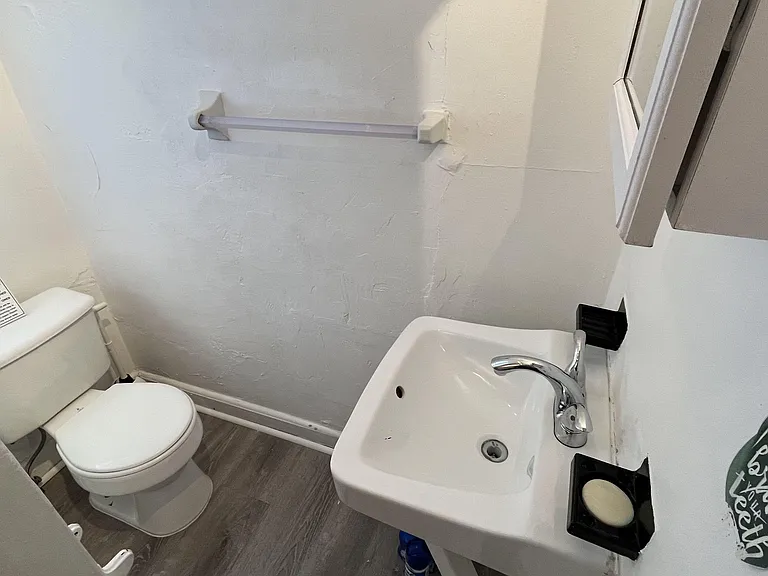 Shared bathroom for Room 1, 2, and 3. Maid service cleans common areas every 3 weeks.