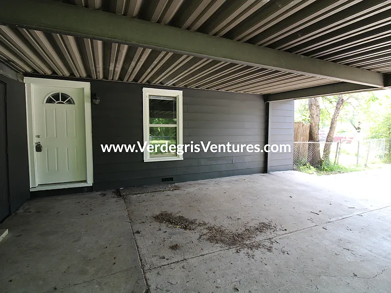 Residents benefit from carport parking and a simple, direct route into the home through the back door