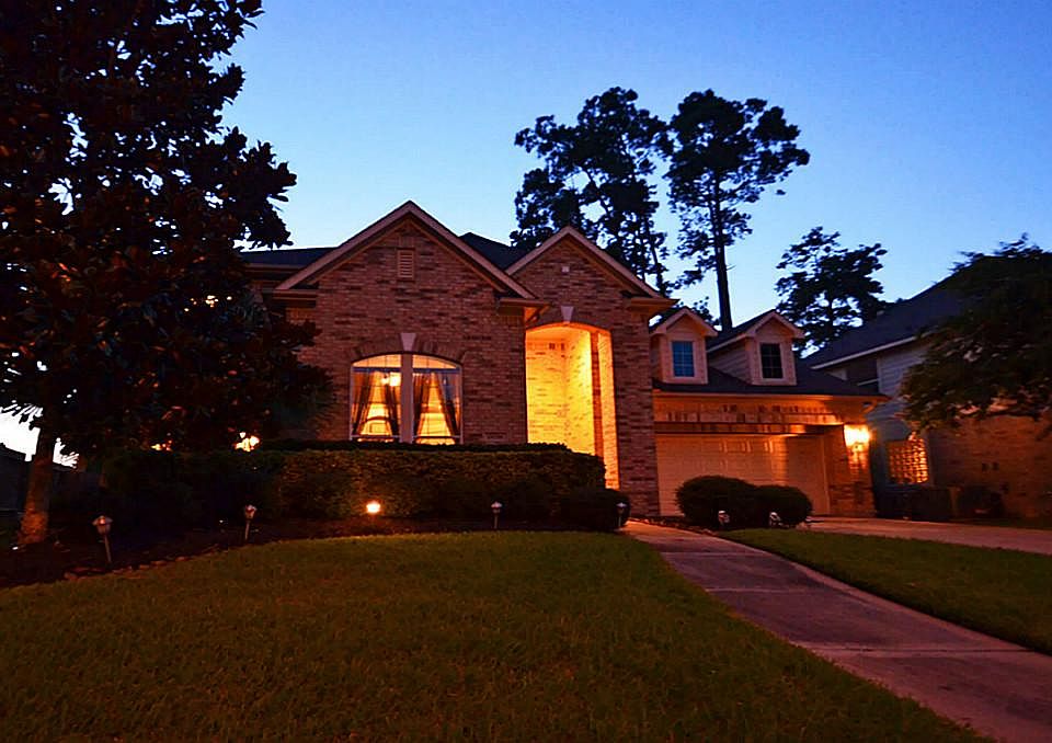 Lovely traditional home nestled in secluded enclave.