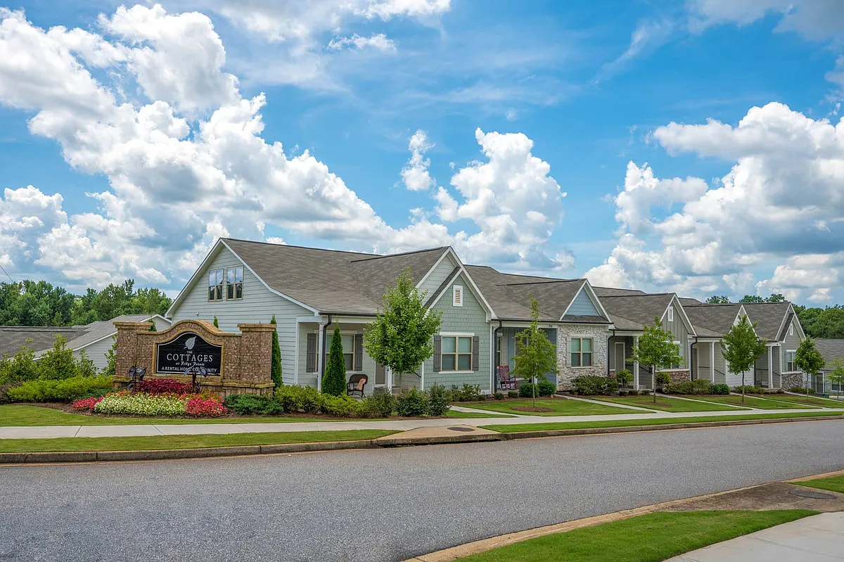 Exterior view highlighting the property's entrance. - Cottages at Ridge Pointe