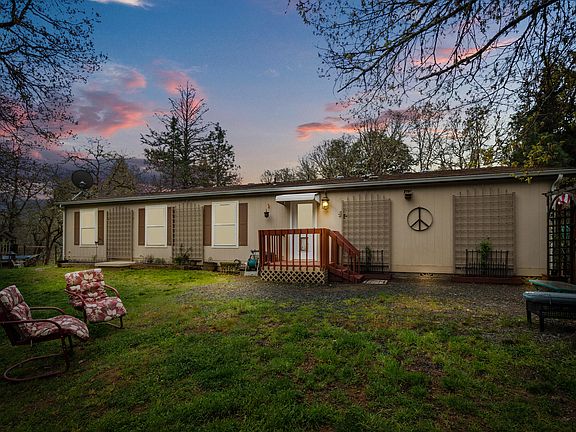 5th image of 3134 W Evans Creek Rd