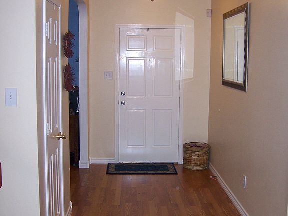 Entry 6x12 New laminate flooring and lighting. 17' ceiling