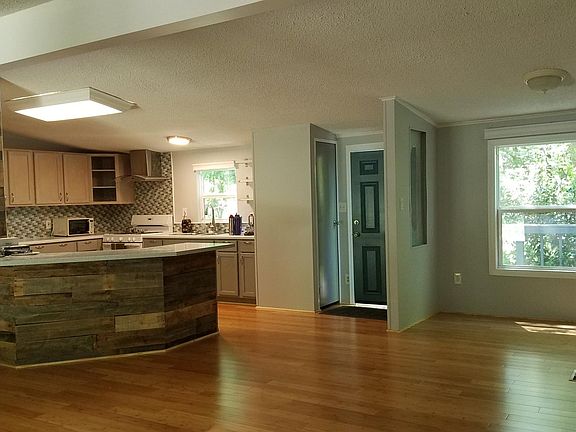 Central living, dining, kitchen area