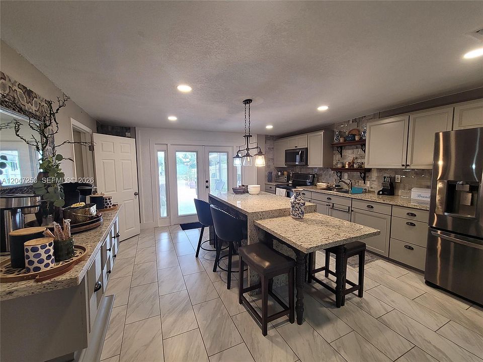 1st image of 6691 W 15th Ct #1