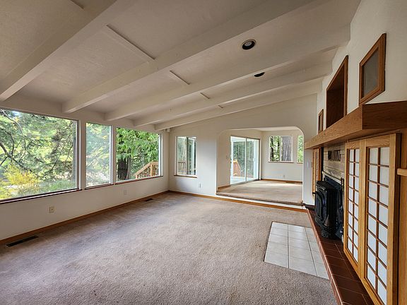 This is the same photo of the living room with wood-burning fireplace without the virtual staging.