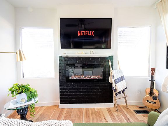 Smart TV & sofa included.