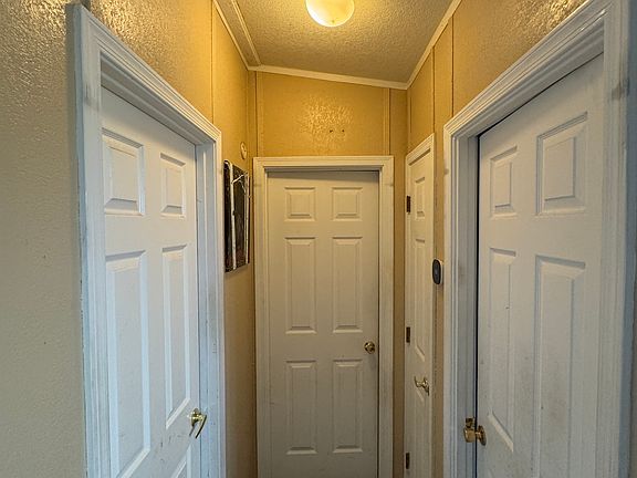 Hallway, bedroom 1 & 2, guest bath entrance.
