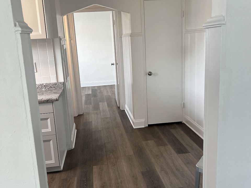view from family room to kitchen on way to bath and bedroom