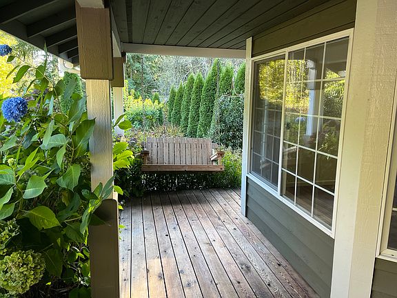 Covered front porch with swing