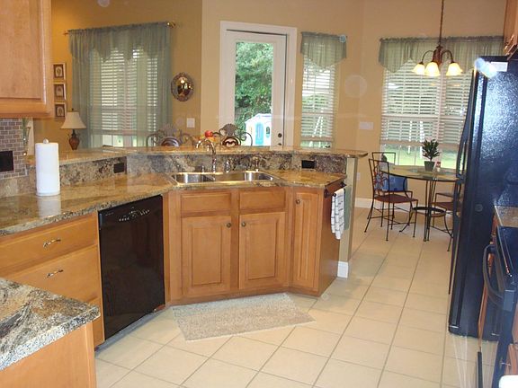 Kitchen with solid granite counters