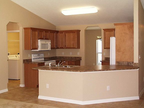 Cook's kitchen with upgraded Whirlpool appliances