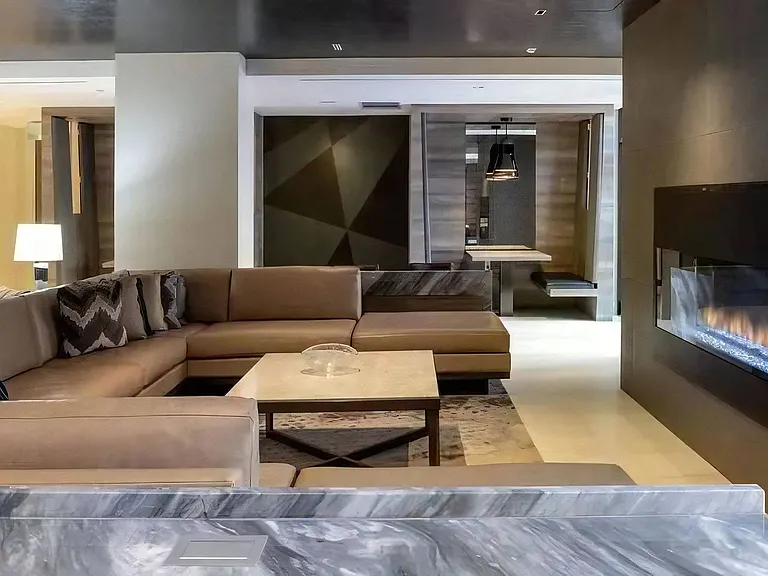 Clubhouse With Built-In Fireplace and Sectional Couch Seating