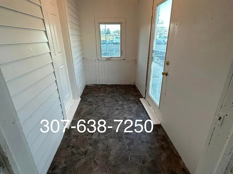 Enclosed front porch/ mud room