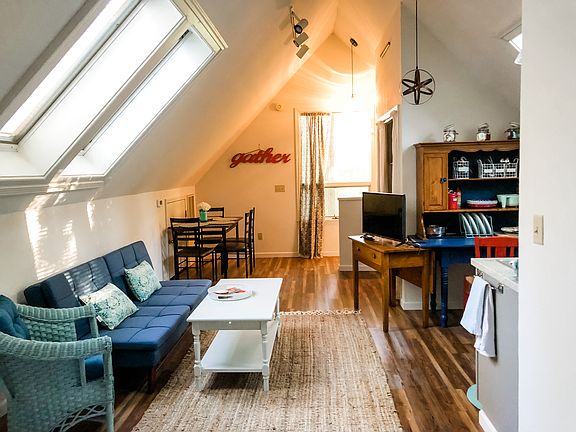 Studio-style with double bed, seating area including futon couch for a guest from time to time, dining area, large walk-in closet with supplemental baby equipment (which can be stored elsewhere if not needed), kitchen hutch with diningware and cookware.