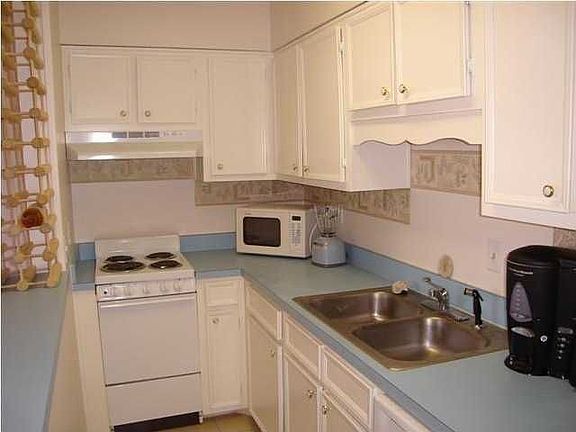 Fresh white cabinets, enjoy your "Catch of the Day"