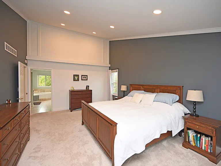 Master bedroom with vaulted ceiling