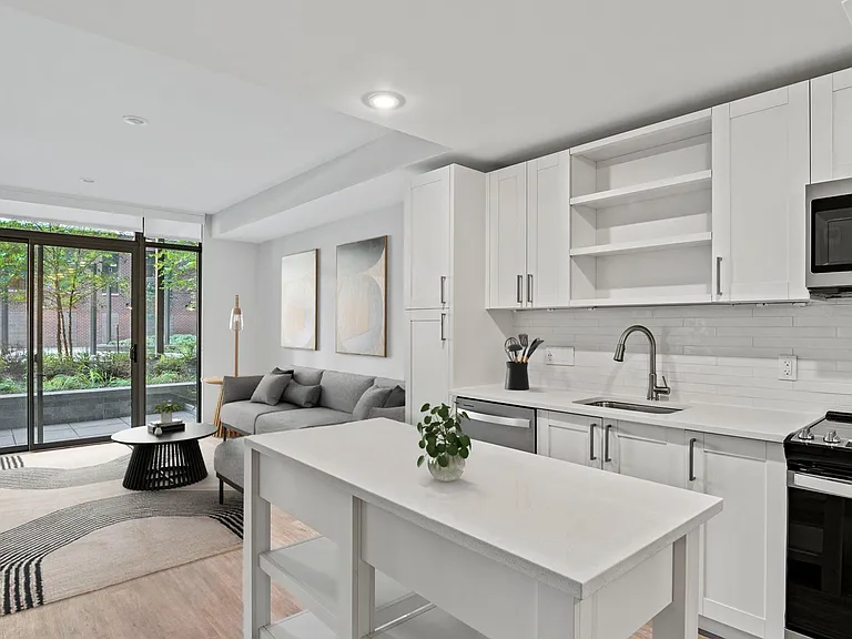 Kitchens equipped with quartz countertops, French door refrigerators, and a large kitchen island will encourage you to whip up your favorite meals
