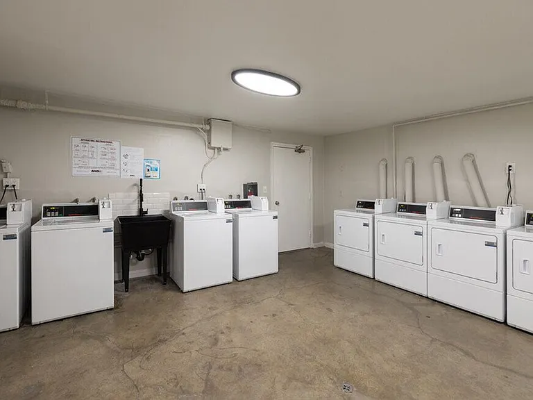 Clean, well-maintained community laundry room.