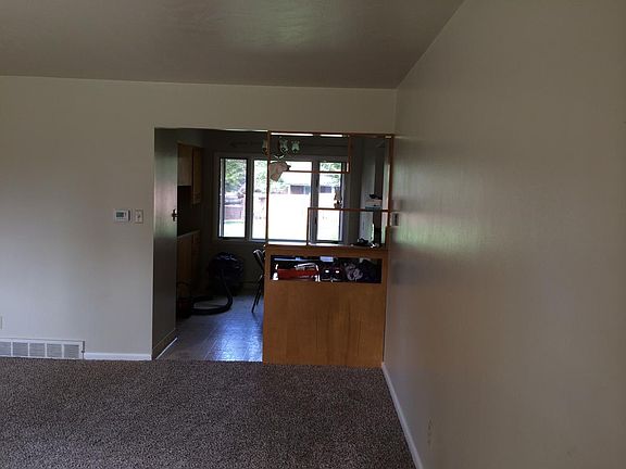 From Living Room into dining room and back yard