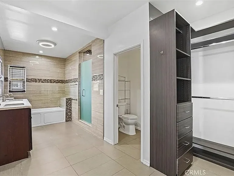 Master bath and one of two closets