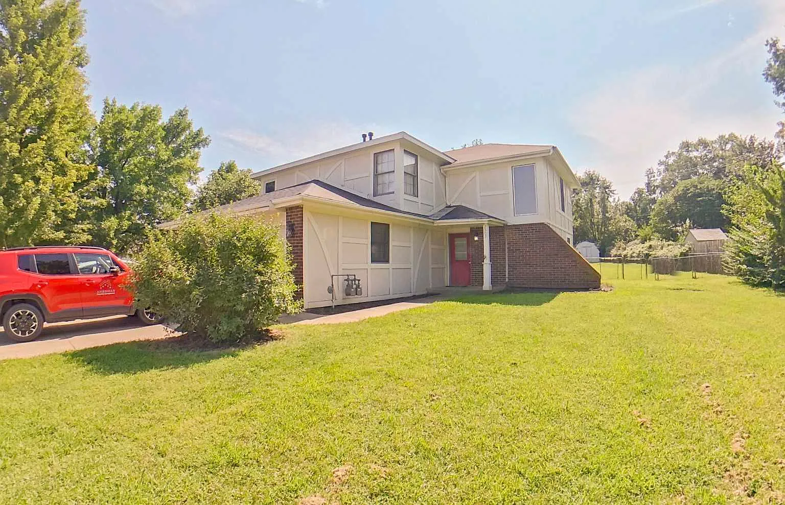 West Side + Fenced-in Yard + Pet Friendly + Washer & Dryer Included Attached 1-Car Garage! Availa... — Photo 2