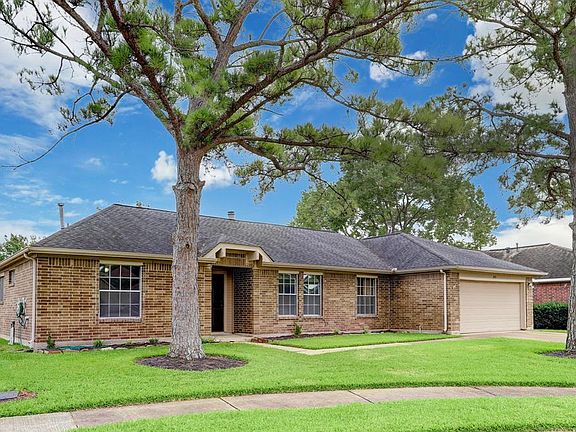 This lovely home sits on a cul de sac and has over 10,000 square feet of land!